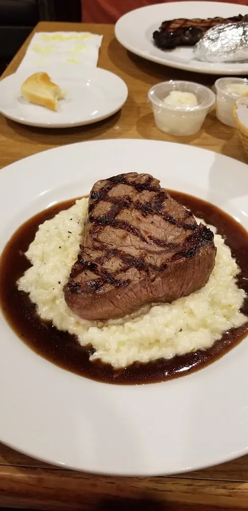9 Oz Sirloin Steak over Parmesan Risotto